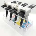 Quattro pistole cartucce per miscelazione