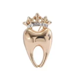 Spilla molare dorato con corona