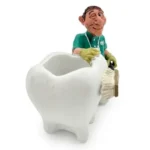 Statuetta dente con dentista